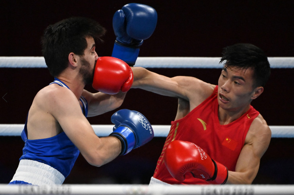 法国拳击选手击败对手成功晋级